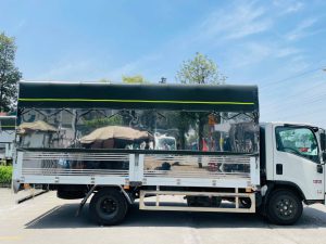 Alternative view of Xe tải Isuzu NPR 400 thùng bạt 3.490 tấn thùng 5.2m